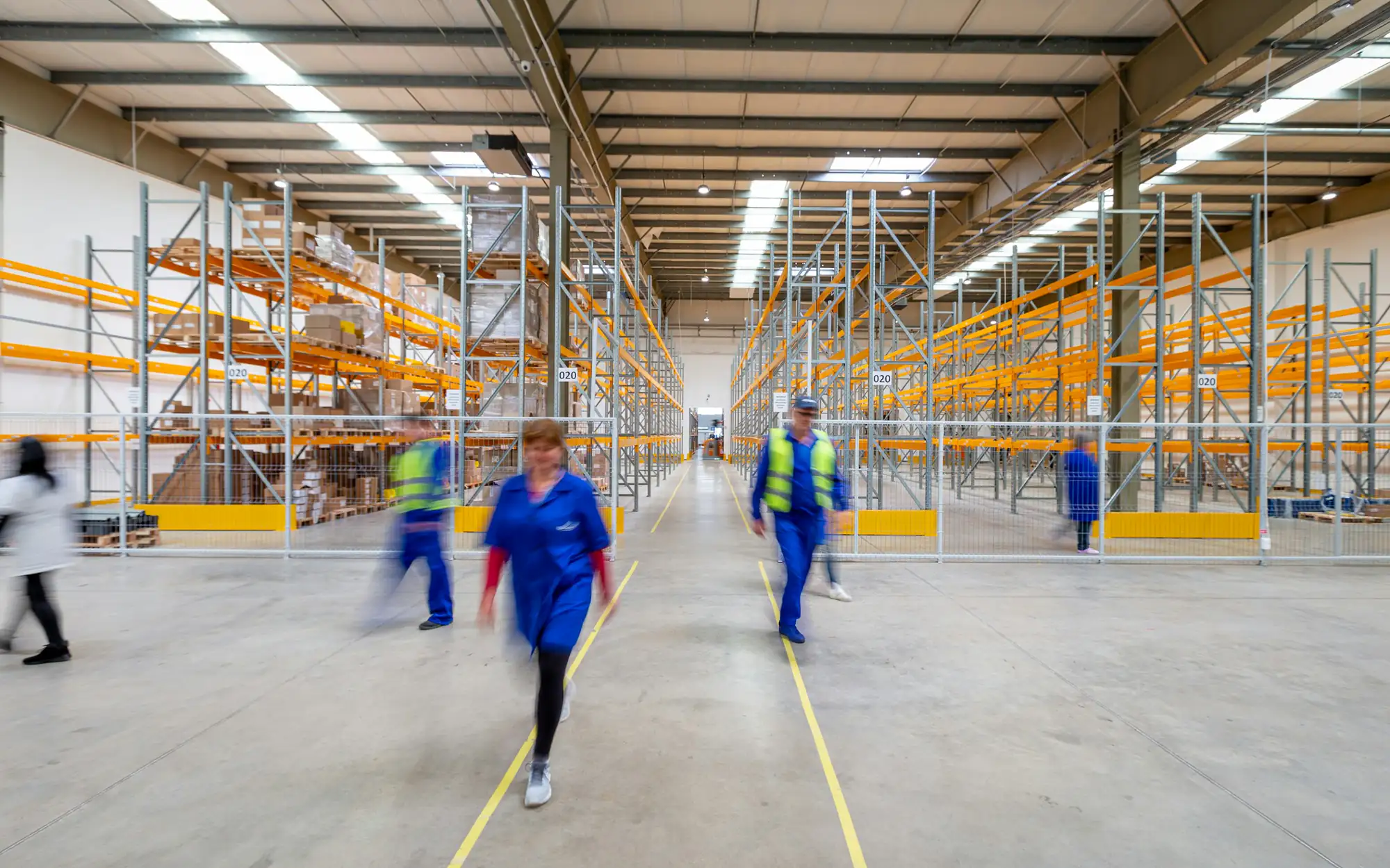 Racking and picking aisles in a pharmaceutical distribution warehouse