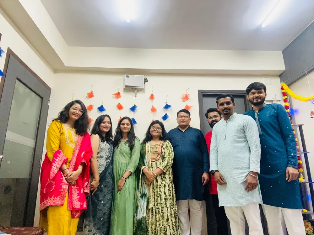 Colleagues in traditional dress celebrating a festival at the PharmExpert office